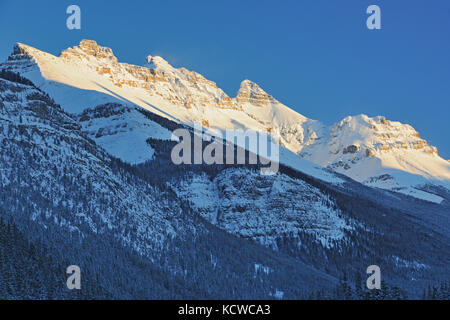 The Canadian Rocky Mountains along the Icefields Parkway  in evening light, Banff National Park, Alberta, Canada Stock Photo