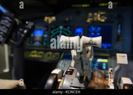 Engine lever in the cockpit of an airliner Stock Photo