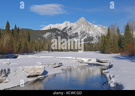 Canadian Rockies in winter, Kananaskis River and Mt. Lorette, Kananaskis Country, Alberta, Canada Stock Photo