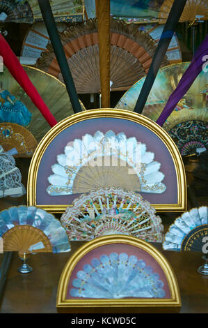 Decorative traditional Spanish fans displayed in a store window in Madrid Stock Photo