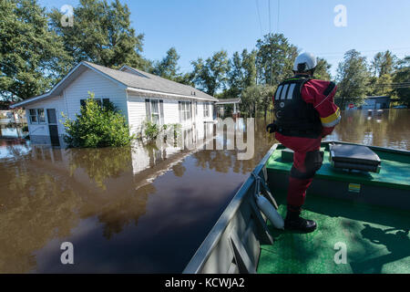 The Flooded town of Nichols S.C., heavy rains caused by Hurricane Matthew flooded the town which caused the evacuation of all its residents, Oct. 10, 2016. Governor Nikki Haley declared a State of Emergency Oct. 4, 2016 and the National Guard was called up to support state and county emergency management agencies and local first responders with coastal evacuations.  (U.S. Air National Guard photo by Tech. Sgt. Jorge Intriago) Stock Photo