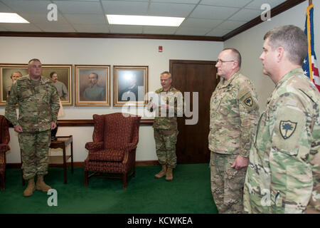 U.S. Army Col. Andrew Batten, South Carolina Army National Guard, is awarded the South Carolina Military Department Meritorious Service Medal by Maj. Gen. Gregory Batts, Assistant Adjutant General for the South Carolina Army National Guard, at Joint Force Headquarters, Columbia, S.C., Jan. 18, 2017.  Batten is recognized for his work directing aviation support during Hurricane Matthew in Oct. 2016. Stock Photo