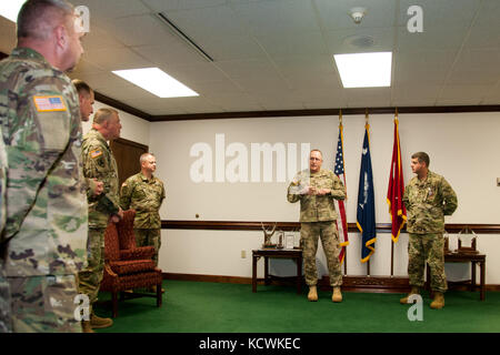 U.S. Army Col. Andrew Batten, South Carolina Army National Guard, is awarded the South Carolina Military Department Meritorious Service Medal by Maj. Gen. Gregory Batts, Assistant Adjutant General for the South Carolina Army National Guard, at Joint Force Headquarters, Columbia, S.C., Jan. 18, 2017.  Batten is recognized for his work directing aviation support during Hurricane Matthew in Oct. 2016. Stock Photo