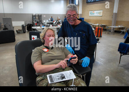 South Carolina National Guard Soldiers donate blood during a &quot;Blood Drive&quot; held at the S.C. National Guard's armory located on Bluff Road on January 19, 2017, Columbia, S.C.  (U.S. Army National Guard photo by Staff Sgt. Roberto Di Giovine/Released) Stock Photo