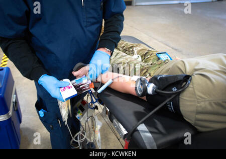 South Carolina National Guard Soldiers donate blood during a &quot;Blood Drive&quot; held at the S.C. National Guard's armory located on Bluff Road on January 19, 2017, Columbia, S.C.  (U.S. Army National Guard photo by Staff Sgt. Roberto Di Giovine/Released) Stock Photo