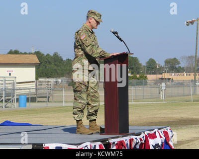 The South Carolina Army National Guard’s 51st Military Police Battalion conducted a change of command ceremony at Florence Memorial Stadium in Florence, South Carolina, Feb. 12, 2017. The outgoing commander Lt. Col. Jason Turner relinquished command to Maj. Erika Perry. (Courtesy Photo) Stock Photo