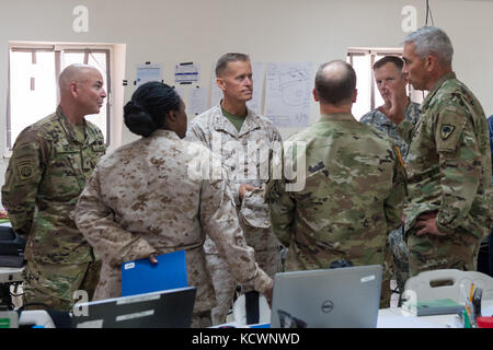 U.S. Army Lt. Col. Jamie Fowler, South Carolina Army National Guard, 122nd Engineer Battalion commander, discusses operations within the Higher Control (HICON) of Eager Lion 16 to U.S. Marine Corps Maj. Gen. Carl E. Mundy, III, 5th Marine Expeditionary Brigade commander, May 21, 2016. Eager Lion 16 is a bilateral, scenario-based exercise with the Hashemite Kingdom of Jordan, designed to exchange military expertise and improve interoperability among partner nations. As part of Eager Lion 16, Fowler is the HICON coordinator, and Mundy is the Combined Joint Task Force deputy commander. (U.S. Army Stock Photo