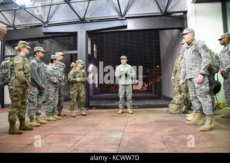 Soldiers with the South Carolina National Guard receive an early morning briefing before heading downtown to support the 58th Presidential Inauguration Jan. 20, 2017, in the District of Columbia. Approximately 30 Soldiers from the South Carolina National Guard joined the more than 7,500 citizen-Soldiers and Airmen from about 40 states and territories in the Nation's capital to provide support for the 58th Presidential Inauguration in the District of Columbia, Jan. 20, 2017. The support of the National Guard, including South Carolina, is at the request of the local civilian authorities, as well Stock Photo