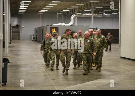 U.S. Army Lt. Gen. Jeffrey S. Buchanan, U.S. Army North (Fifth Army) commander, presents the Army Superior Unit Award to U.S. Army Maj. Gen. Glenn A. Bramhall, 263rd Army Air and Missile Defense Command (AAMDC) commander, on behalf of the 263rd AAMDC, South Carolina Army National Guard, during a visit to the unit headquarters in Anderson, South Carolina, Feb. 9, 2017. (US Army National Guard Photo by Staff Sgt. Roby Di Giovine/Released) Stock Photo