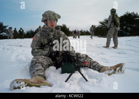 Soldiers in the snow on operations Stock Photo