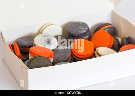 Set of different french cookies macaroons in a paper box. Stock Photo