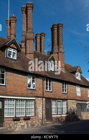 The pretty village of Albury in Surrey, UK. Old buildings with decorative chimneys. Stock Photo