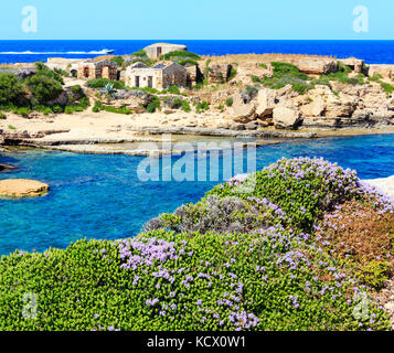Spiaggia Massolivieri beach summer sea landscape (Siracusa, Sicily, Italy). People unrecognizable. Stock Photo