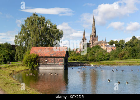 Lichfield Cathedral and Stowe Pool with boathouse, Lichfield, Staffordshire, England, United Kingdom, Europe Stock Photo