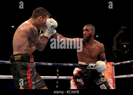 Sam Eggington (left) in action against Mohamed Mimoune during their EBU Welterweight Championship at Manchester Arena. Stock Photo