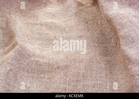 wrinkled Hessian sack cloth or gunny sack, selective focus Stock Photo