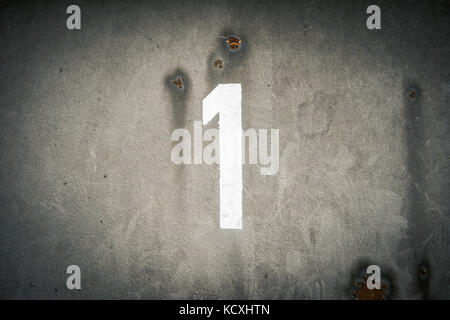 Number 1 one painted on a wall stencil Stock Photo