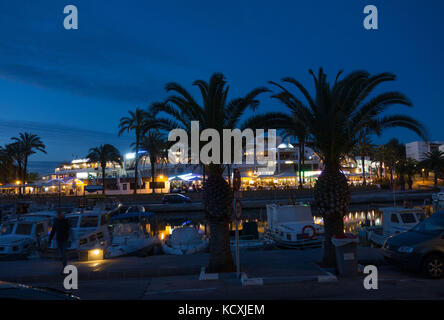 Yachts moored in Marina De Cala D'Or at dusk, Cala d'Or, Majorca, Balearic Islands, Spain. Stock Photo