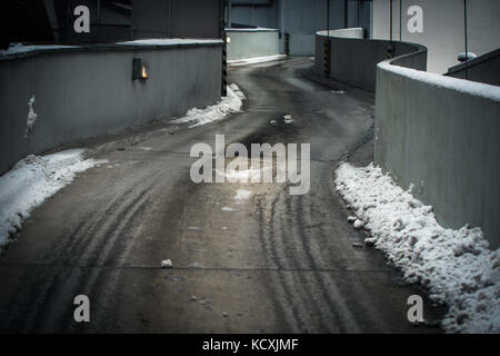 Car parking parkhouse space entrance in winter snow Stock Photo