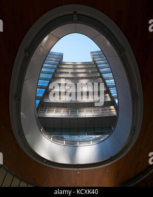 Milan: one of the buildings in Gae Aulenti Square, an elevated circular square designed by Cesar Pelli in the new Porta Nuova Garibaldi district Stock Photo