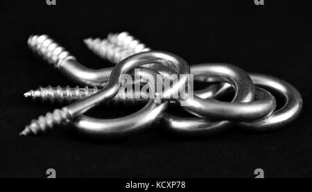 stainless steel hook with conical thread, a group of abstract metal hook Stock Photo