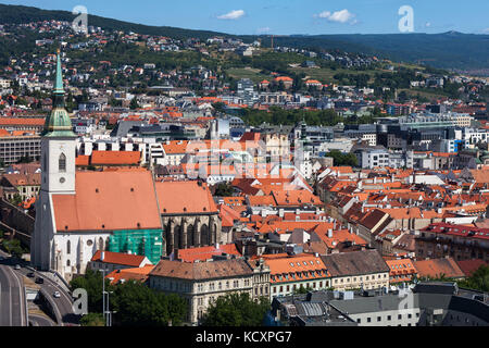 Bratislava Old Town in Slovakia, capital city historic center, St. Martin Cathedral on the left. Stock Photo