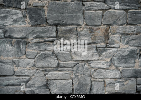 Old stone wall texture backdrop background Stock Photo