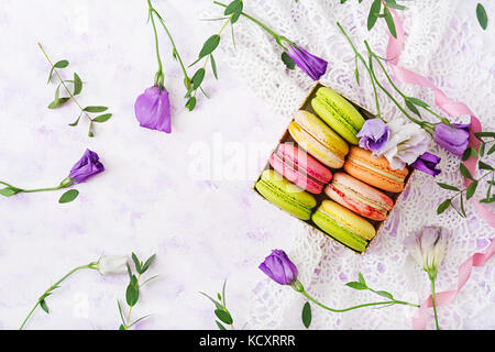 Colorful macaroons  on a ligth  background. Flat lay. Top view Stock Photo