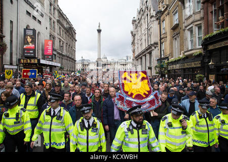 London, UK. 7th Oct, 2017. Demonstrators participate in a march by the Football Lads Alliance (FLA), from Pall Mall to Westminster Bridge. Credit: Thabo Jaiyesimi/Alamy Live News