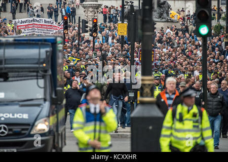 London, UK. 7th Oct, 2017. Thousands of Football Lads Alliance (FLA), Veterans Against Terrorism and other supporters rally and march through central London against extremism and the recent terror attacks in the UK and Europe. Credit: Guy Corbishley/Alamy Live News Stock Photo
