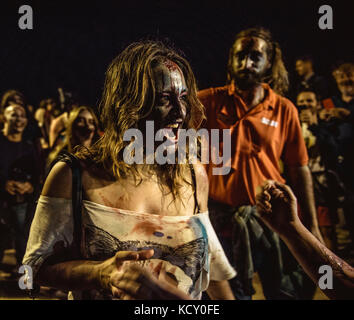 Sitges, Spain. 7th Oct, 2017. People made up as zombies take part in the Sitges Zombie Walk 2017 Credit: Matthias Oesterle/Alamy Live News Stock Photo