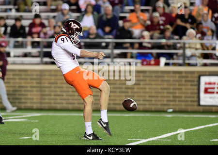 Chestnut Hill, Mass. 7th Oct, 2017. Virginia Tech Hokies punter Oscar Bradburn (91) punts the ball during the NCAA division 1 football game between the Virginia Tech Hokies and the Boston College Eagles, held at Alumni Stadium, in Chestnut Hill, Mass. Virginia Tech defeats Boston College 23-10. Eric Canha/CSM/Alamy Live News Stock Photo