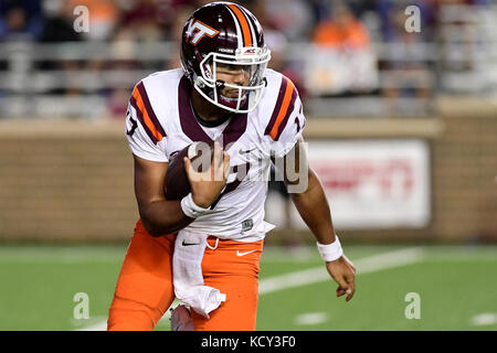 Chestnut Hill, Mass. 7th Oct, 2017. Virginia Tech Hokies quarterback Josh Jackson (17) runs the ball during the NCAA division 1 football game between the Virginia Tech Hokies and the Boston College Eagles, held at Alumni Stadium, in Chestnut Hill, Mass. Virginia Tech defeats Boston College 23-10. Eric Canha/CSM/Alamy Live News Stock Photo