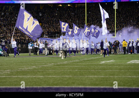 Seattle, WA, USA. 7th Oct, 2017. The Washington Huskies enter the field before a PAC12 football game between the Cal Bears and the Washington Huskies. The game was played at Husky Stadium on the University of Washington campus in Seattle, WA. Jeff Halstead/CSM/Alamy Live News Stock Photo