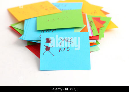 picture of a Note papers on white background,yes no concept Stock Photo