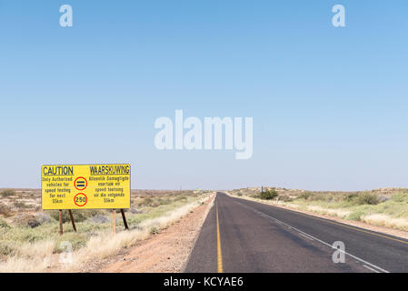 A speed limit warning sign on the R360-road between Askham and Upington in the Northern Cape Province of South Africa Stock Photo
