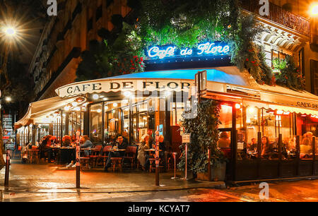 The famous cafe de Flore at rainy night, Paris, France. Stock Photo