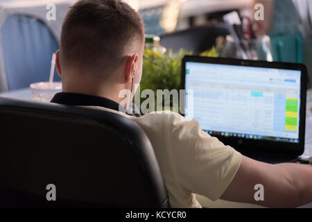 Man works at laptop Stock Photo