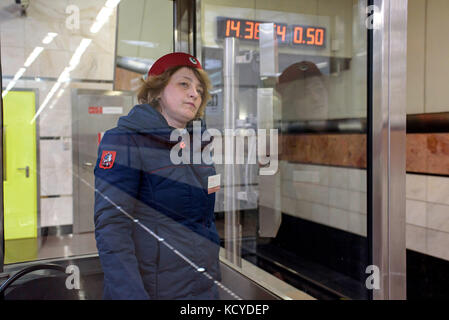 Vera Kolesnikova has been employed since 2008 at the Kotelniki station, the last station of the Tagansko-Krasnopresnenskaya line. Installed in its cab Stock Photo