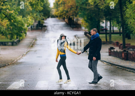 Portrait of affectionate couple taking a walk in the city Stock Photo