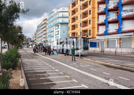 Spain, Blanes - 16.09.2017: Embarkation of passengers in a tourist bus on the city street Stock Photo