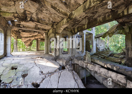 Inside the old destroyed military barracks ruins from the World War II at Westerplatte in Gdansk, Poland. Stock Photo