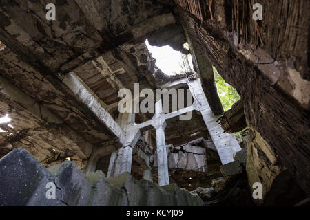 Inside the old destroyed military barracks ruins from the World War II at Westerplatte in Gdansk, Poland. Stock Photo