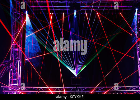 Laser light show on the club stage. Stock Photo