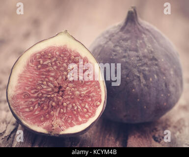 Fresh organic common fig on textured surface Stock Photo