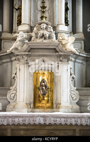 Detail of a tabernacle in a Catholic church in which are preserved the consecrated hosts after the Eucharistic celebration. Stock Photo