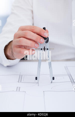 Close-up Of A Architect Drawing Plan On Blueprint Stock Photo