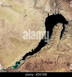 satellite image of Longyangxia Dam Solar Park in China . In 2017, solar panels covered 27 square kilometers (10 square miles) of Qinghai province. Acc Stock Photo