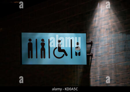 Moody sign of WC on a wall. Stock Photo