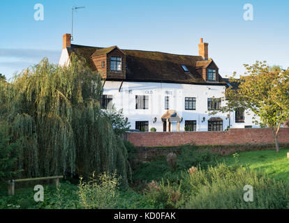 The Old Mill hotel at Shipston on stour in morning sunlight, Warwickshire. UK